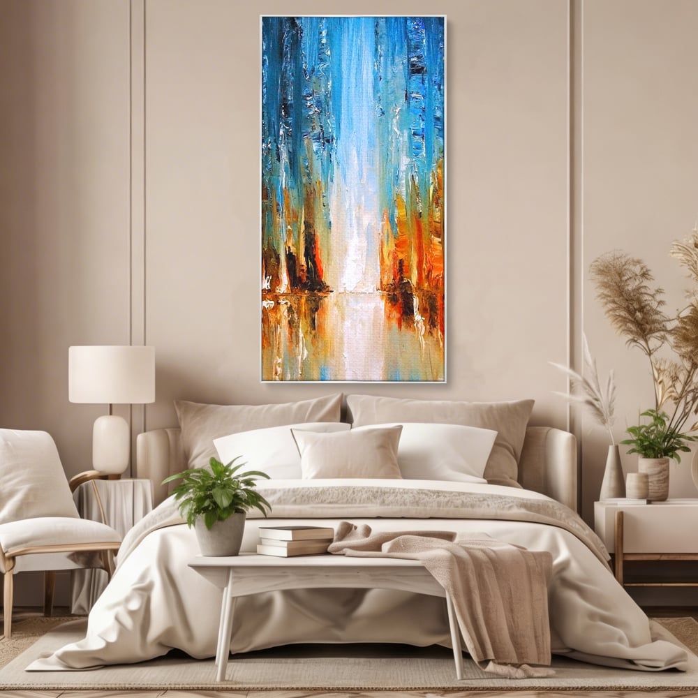 Tablou canvas cu pictura abstracta cu cascada albastra, in rama de aluminiu argintiu, pe perete intr-un dormitor